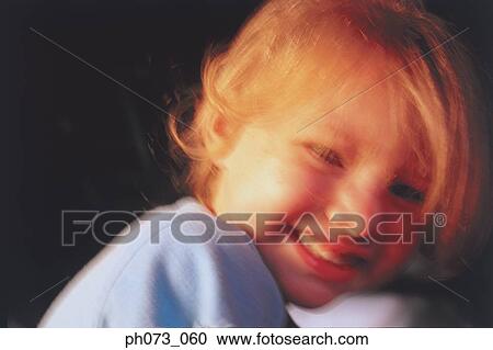 Portrait of a young girl smiling View Large Photo Image Stock Image - Portrait of a young girl smiling. Fotosearch