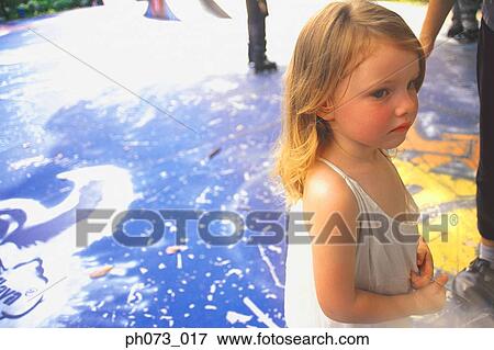 Portrait of a young girl View Large Photo Image Stock Photo - Portrait of a young girl . Fotosearch