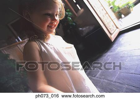 Stock Photograph - Portrait of a young girl . Fotosearch