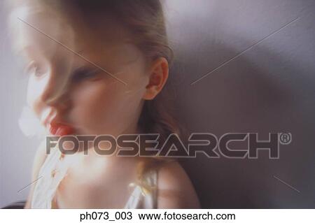 Stock Image - View of a young girl, blur. Fotosearch