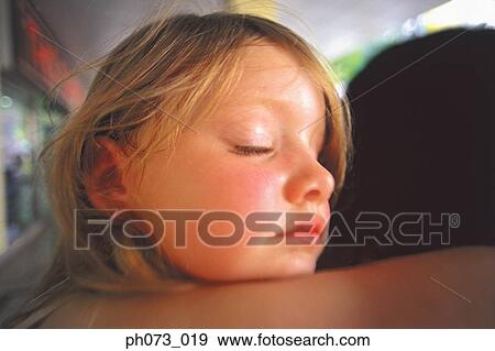 Young girl holding a branch View Large Photo Image Stock Photo - Young girl holding a branch. Fotosearch