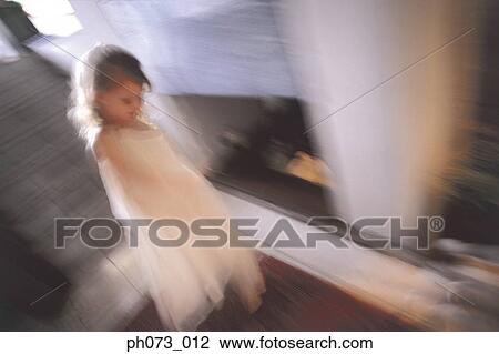 Young girl in corridor, blur motion View Large Photo Image Stock Image - Young girl in corridor, blur motion. Fotosearch