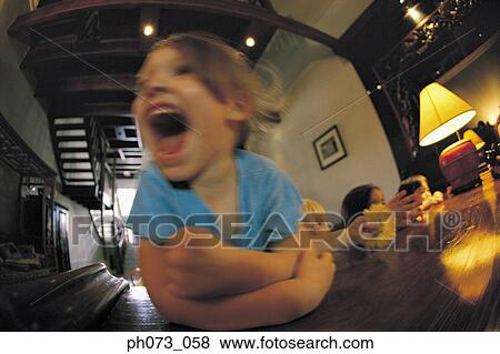 Young girl laughing, friends in background View Large Photo Image Stock Photo - Young girl laughing, friends in background. Fotosearch