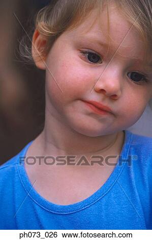 Young girl rubbing eye, close-up View Large Photo Image Stock Photograph - Young girl rubbing eye, close-up. Fotosearch
