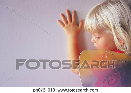 Young girl wearing wings View Large Photo Image Stock Image - Young girl wearing wings. Fotosearch