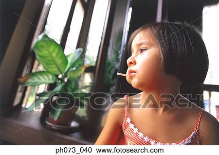 Young girl with pensive expression View Large Photo Image Stock Image - Young girl with pensive expression. Fotosearch