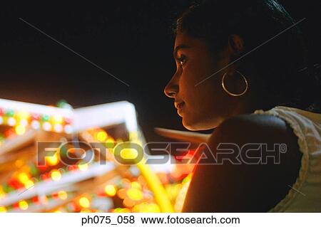 Side view of young Indian woman View Large Photo Image Stock Photo - Side view of young Indian woman. Fotosearch