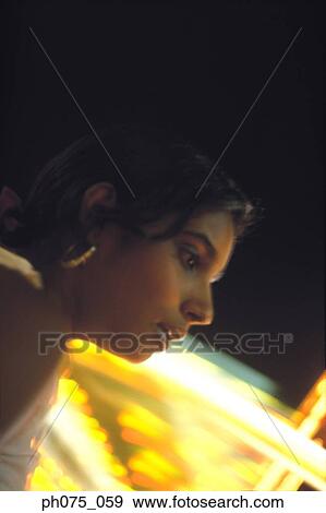 Side view of young Indian woman View Large Photo Image Stock Photo - Side view of young Indian woman. Fotosearch