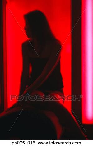 Silhouette of young woman in nightclub View Large Photo Image Stock Photograph - Silhouette of young woman in nightclub. Fotosearch