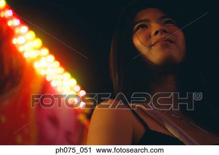 Young woman in carnival View Large Photo Image Stock Image - Young woman in carnival. Fotosearch
