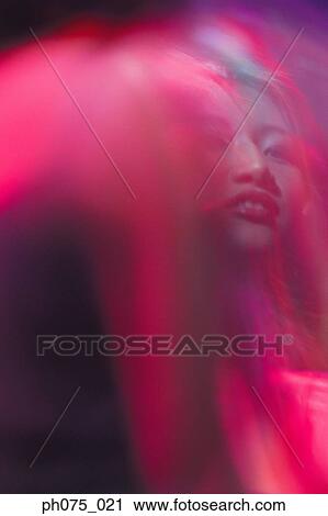 Young woman in nightclub View Large Photo Image Stock Image - Young woman in nightclub. Fotosearch