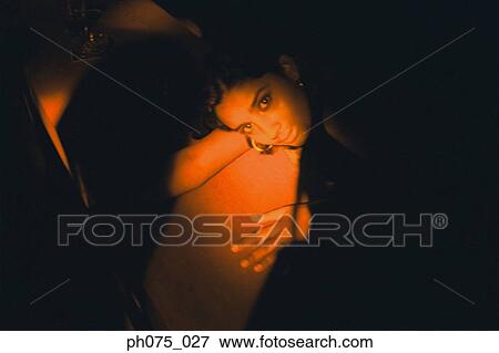 Young woman resting head on table, view from top View Large Photo Image Stock Photo - Young woman resting head on table, view from top. Fotosearch