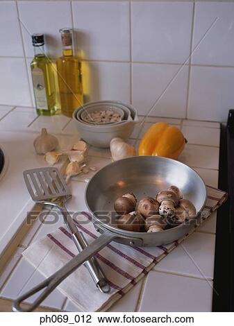 Button mushrooms in pan, elevated view, close-up View Large Photo Image Stock Image - Button mushrooms in pan, elevated view, close-up . Fotosearch