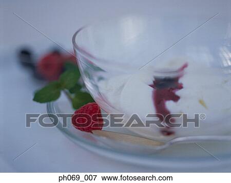 Close-up of a bowl of raspberries dessert View Large Photo Image Stock Photo - Close-up of a bowl of raspberries dessert. Fotosearch