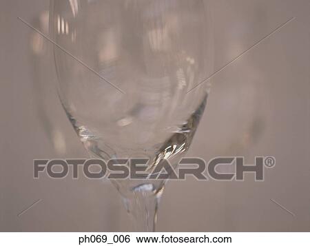 Close-up of a wine glass View Large Photo Image Stock Photograph - Close-up of a wine glass . Fotosearch