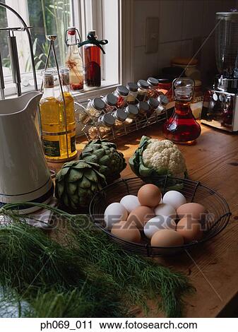 Food items and ingredients on kitchen table View Large Photo Image Stock Image - Food items and ingredients on kitchen table. Fotosearch