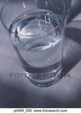 Glass of water, elevated view, close-up View Large Photo Image Stock Photography - Glass of water, elevated view, close-up . Fotosearch