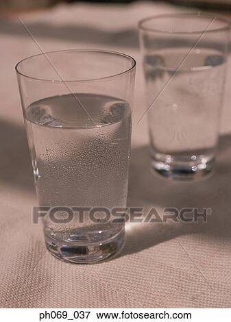 Two glasses of water View Large Photo Image Stock Photo - Two glasses of water. Fotosearch