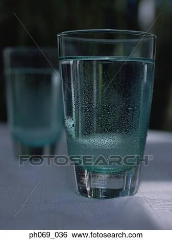 Two glasses of water View Large Photo Image Stock Photograph - Two glasses of water. Fotosearch