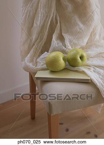 White towel and green apples on chair View Large Photo Image Stock Photography - White towel and green apples on chair . Fotosearch