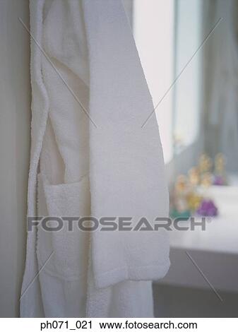 Bathrobe hanging on bathroom wall View Large Photo Image Stock Image - Bathrobe hanging on bathroom wall. Fotosearch