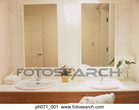 Stock Image - Clean bathroom with amenities. Fotosearch