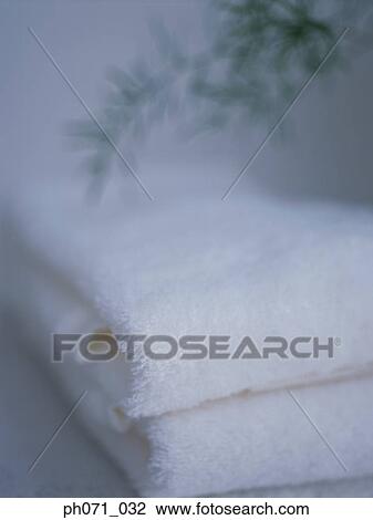 Folded white towels, close-up View Large Photo Image Stock Image - Folded white towels, close-up . Fotosearch