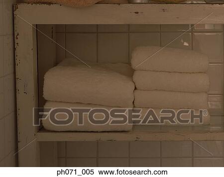 Folded white towels, close-up View Large Photo Image Stock Photography - Folded white towels, close-up . Fotosearch