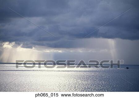 Cloudy sky and sea at sunset View Large Photo Image Stock Photography - Cloudy sky and sea at sunset . Fotosearch