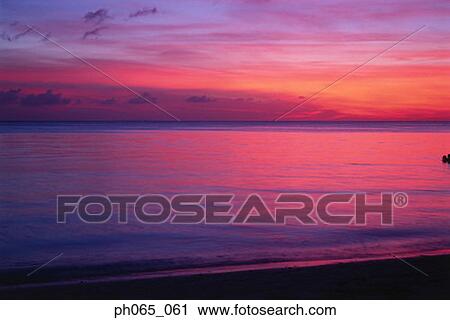 Stock Image - Dawn on beach. Fotosearch