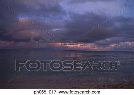 Stock Photo - Storm clouds over beach. Fotosearch