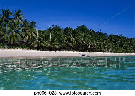 Stock Photo - Beach, raft in a distance. Fotosearch
