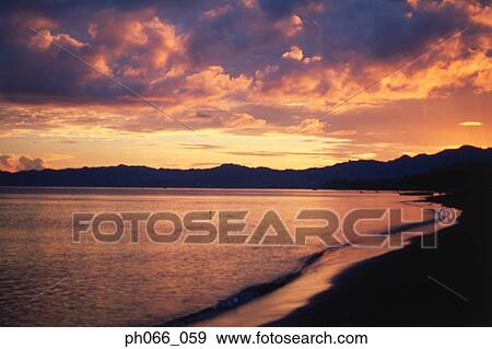 Beach sunset View Large Photo Image Stock Photo - Beach sunset . Fotosearch