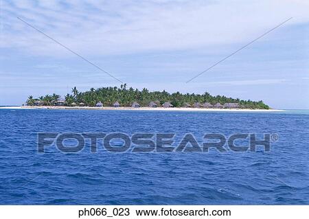 Stock Image - Island on horizon. Fotosearch