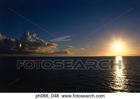 Stock Photo - Ocean sunset . Fotosearch