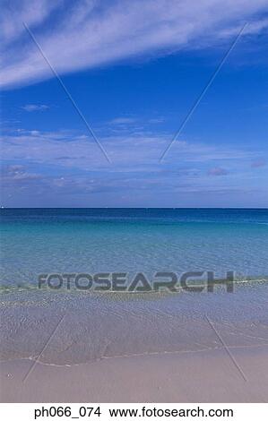 Picture - Waves Breaking on Shore . Fotosearch