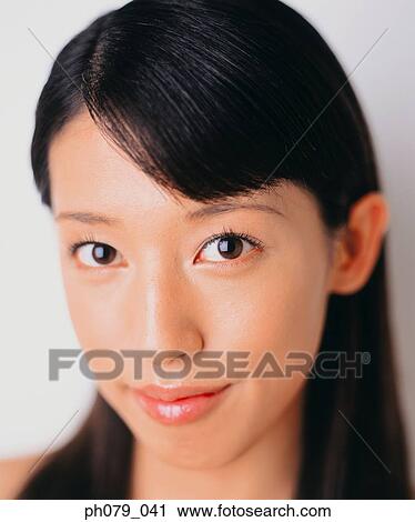 Young woman, close-up, portrait View Large Photo Image Stock Image - Young woman, close-up, portrait. Fotosearch