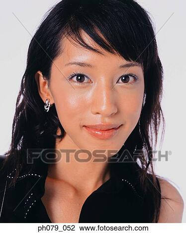 Stock Image - Young woman, close-up, portrait. Fotosearch