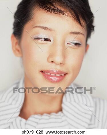 Young woman, close-up, portrait View Large Photo Image Stock Photo - Young woman, close-up, portrait. Fotosearch