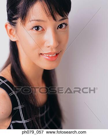 Young woman, close-up, portrait View Large Photo Image Stock Photo - Young woman, close-up, portrait. Fotosearch