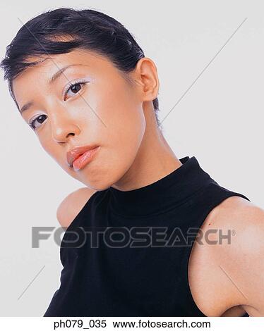 Stock Photography - Young woman, close-up, portrait. Fotosearch