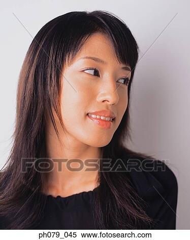 Young woman, close-up, portrait View Large Photo Image Stock Photography - Young woman, close-up, portrait. Fotosearch
