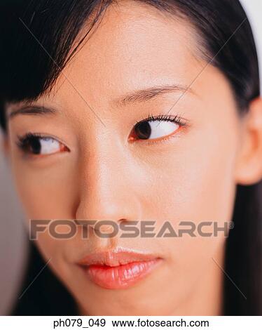 Stock Photo - Young woman, close-up, profile . Fotosearch