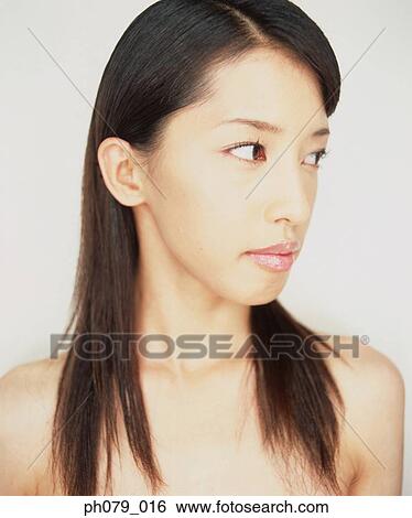 Stock Photograph - Young woman, close-up, profile . Fotosearch