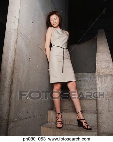 Portrait of a smiling woman, posing View Large Photo Image Stock Image - Portrait of a smiling woman, posing. Fotosearch