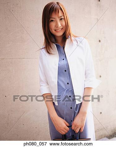 Portrait of a smiling woman, posing View Large Photo Image Stock Photo - Portrait of a smiling woman, posing. Fotosearch