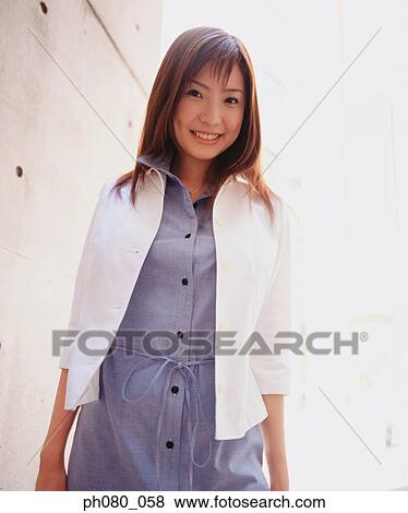 Portrait of a smiling woman, posing View Large Photo Image Stock Photo - Portrait of a smiling woman, posing. Fotosearch