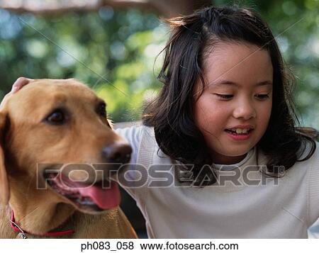 Young girl and pet dog View Large Photo Image Stock Photo - Young girl and pet dog. Fotosearch