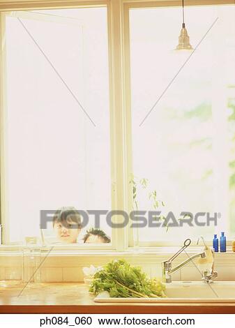 Children peeking into kitchen View Large Photo Image Stock Image - Children peeking into kitchen. Fotosearch