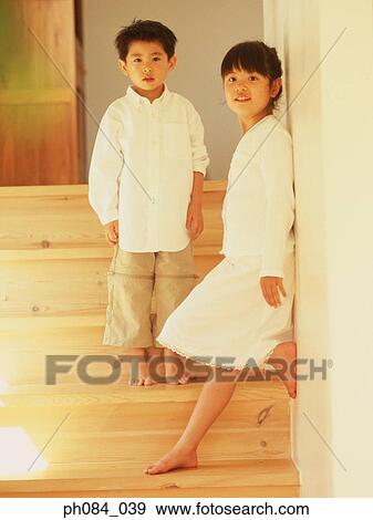 Portrait of brother and sister View Large Photo Image Stock Photo - Portrait of brother and sister . Fotosearch